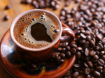 A cup of ready-made coffee and grains - F-249i