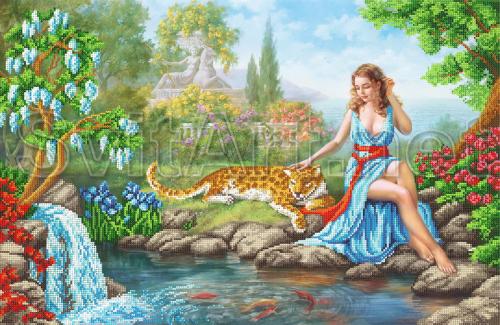 A girl and a leopard on the rocks near the water - SI-700